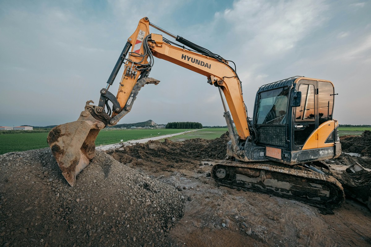 Excavator moving earth on a construction site